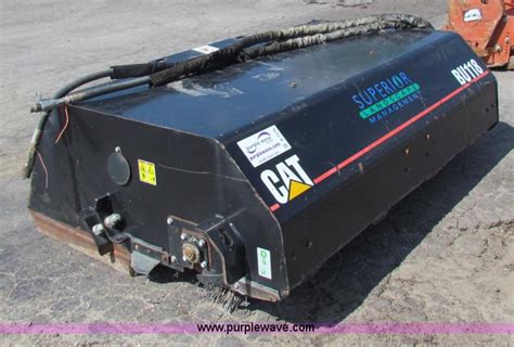 cat skid steer bucket|cat skid steer sweeper attachment.